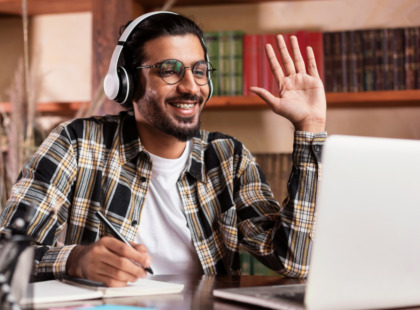 Man at writers retreat waving hello